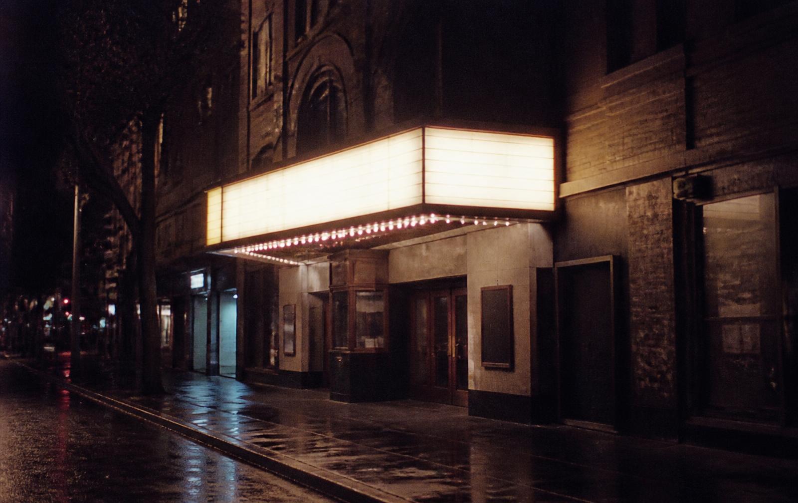Independent cinema facade at night in Greenwich Village, New York